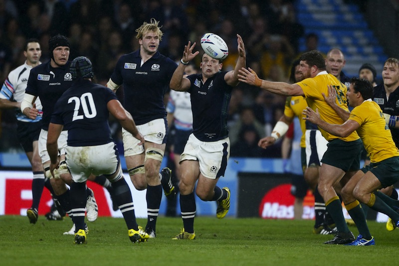 John Hardie of Scotland is tackled by Greg Holmes of Australia before a late penalty was awarded to Australia during their Rugby World Cup Quarter Final at Twickenham in London, Britain October 18, 2015. u00e2u20acu201d Reuters pic