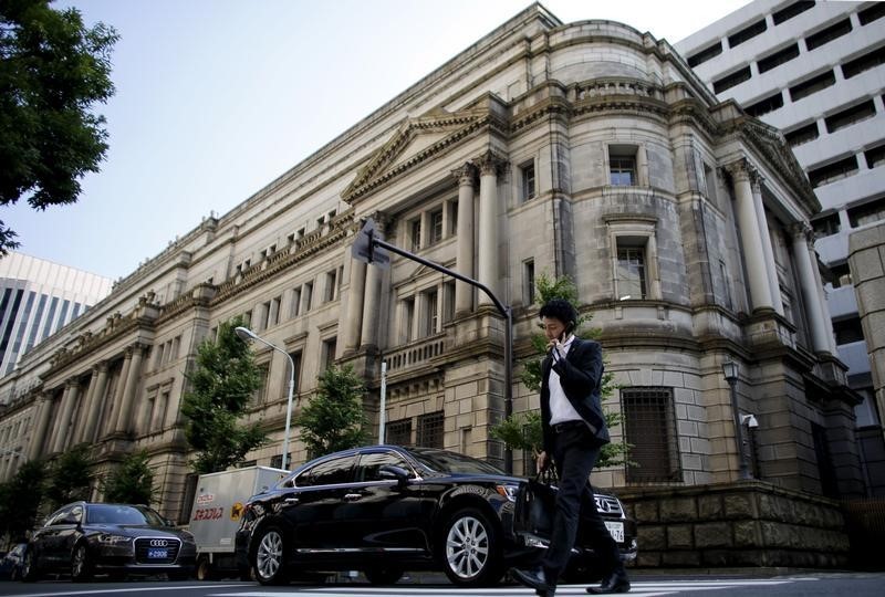 A man walks past the Bank of Japan (BOJ) building in Tokyo, June 24, 2015. u00e2u20acu201d Reuters pic