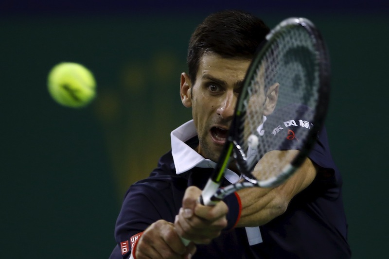Novak Djokovic of Serbia returns a shot to Martin Klizan of Slovakia during their men's singles match at the Shanghai Masters tennis tournament in Shanghai, China, October 14, 2015. u00e2u20acu201d Reuters pic