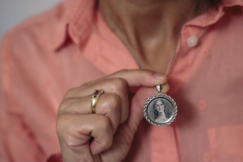 Mona Samaha wears a pendant bearing the image of her daughter Reema, who died in the same classroom as Mary Read in 2007, in Centreville, Virginia, October 4, 2015. u00e2u20acu201d Picture by Lexey Swall/The New York Times 