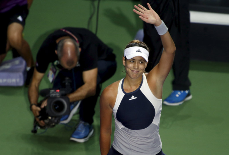 Garbine Muguruza of Spain celebrates defeating Petra Kvitova of the Czech Republic during their womenu00e2u20acu2122s singles tennis match of the WTA Finals at the Singapore Indoor Stadium October 30, 2015. u00e2u20acu201d Reuters pic