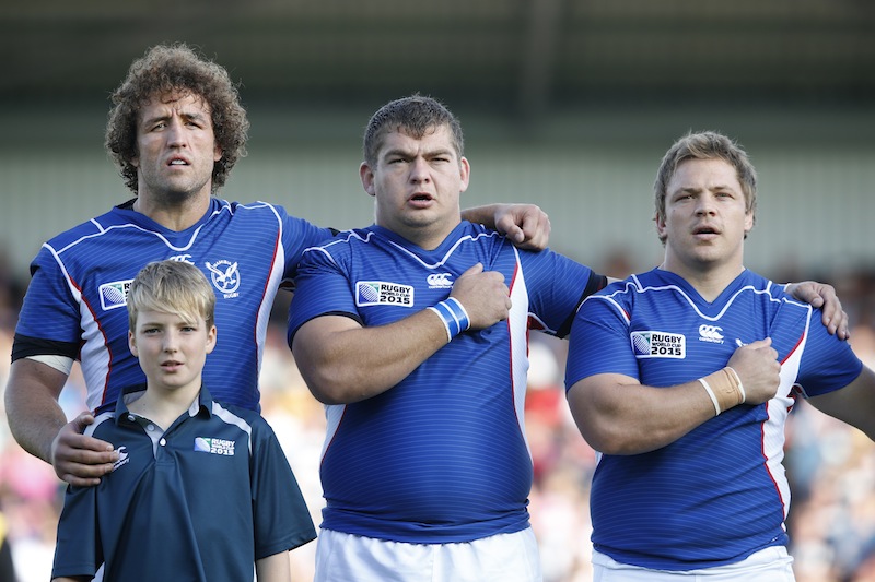 Namibia's Jacques Burger, Casper Viviers and Torsten van Jaarsveld during the national anthem before the Tonga v Namibia IRB Rugby World Cup 2015 Pool C game at Sandy Park, Exeter, England.u00c2u00a0u00e2u20acu201d Reuters pic
