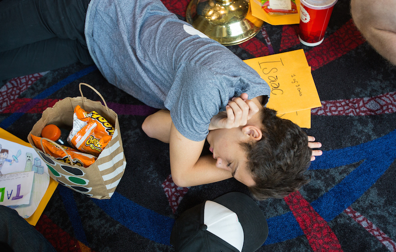 Isaac Blazquez, 17, naps during an event at a video game league event in Seattle, August 29, 2015. — Picture by Ruth Fremson/The New York Times
