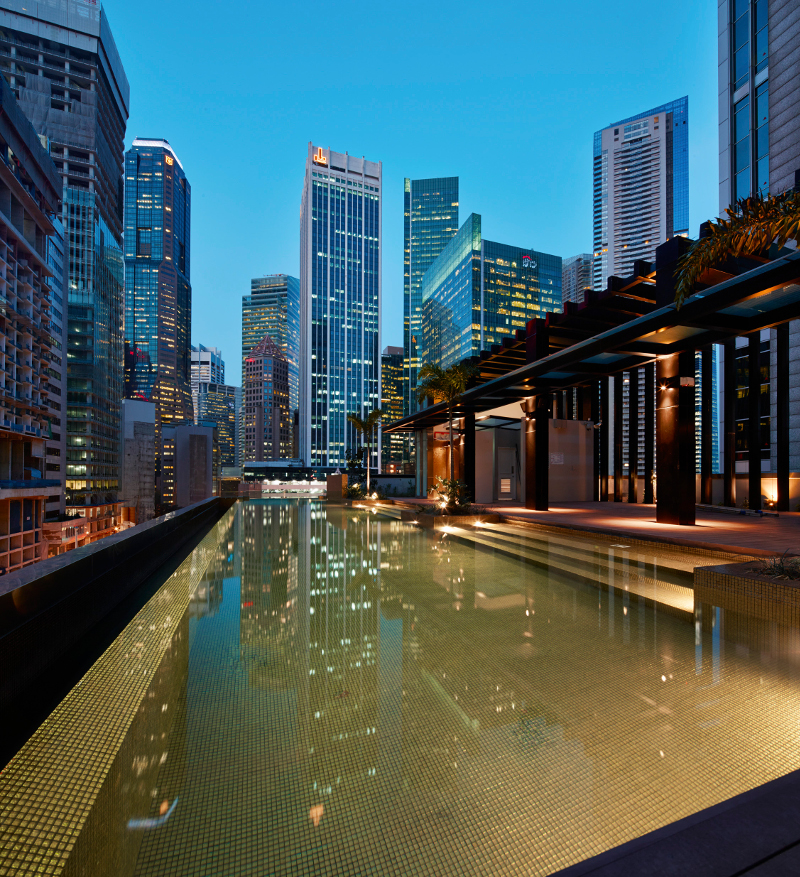 The gold-tiled infinity pool at Sofitel So Singapore, a boutique hotel designed by Karl Lagerfeld in the heart of the city’s financial district. — Jorg Sundermann via The New York Times pic