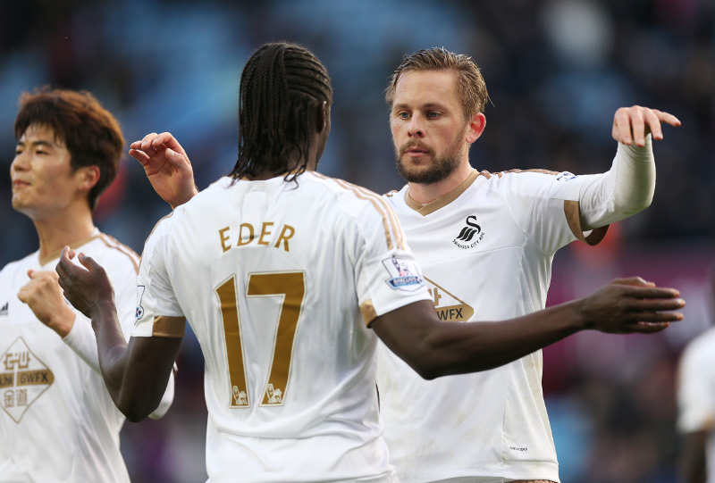 Swanseau00e2u20acu2122s Gylfi Sigurdsson celebrates with Eder at the end of their Barclays Premier League game against Aston Villa  at Villa Park, Oct 24, 2015. u00e2u20acu201d Reuters pic