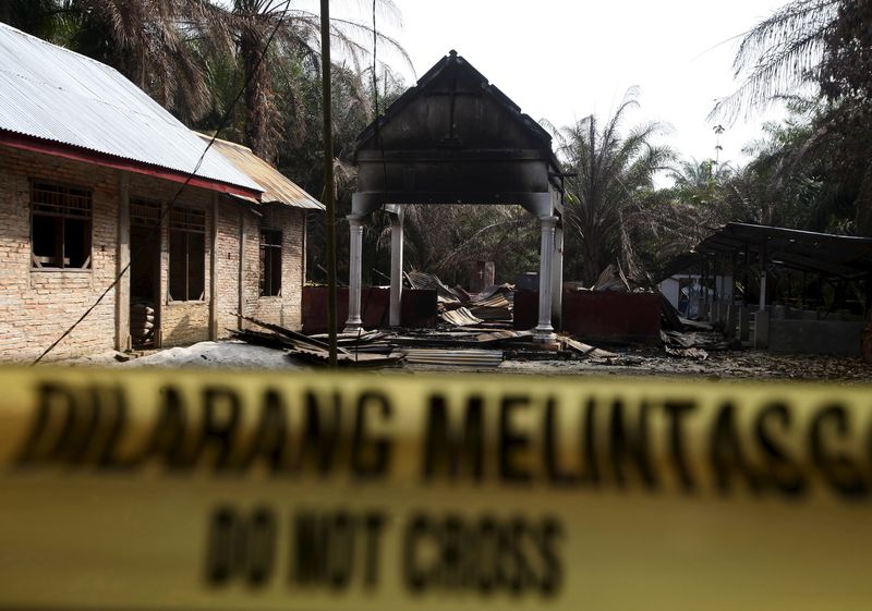 Police tape blocks access to a burned church at Suka Makmur Village in Aceh Singkil, Indonesia Aceh province, October 18, 2015. u00e2u20acu201d Reuters pic 
