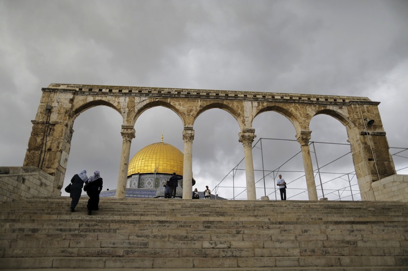 People walk near the Dome of the Rock on the compound known to Muslims as the Noble Sanctuary and to Jews as Temple Mount in Jerusalem's Old City October 26, 2015. u00e2u20acu201d Reuters pic