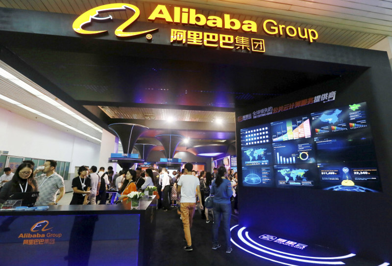 People visit the booth of Alibaba Group during an exhibition in Beijing, China, September 22, 2015. Chinese e-commerce giant Alibaba Group Holding Ltd is lobbying hard to stay off the US Trade Representativeu00e2u20acu2122s blacklist. u00e2u20acu201d Reuters pic