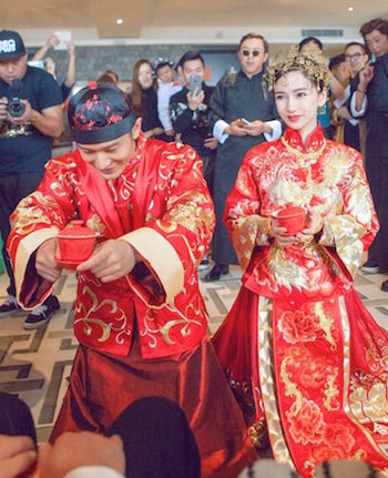 The couple are pictured during their tea ceremony. — Picture via Facebook.com/TheRealAngelababy