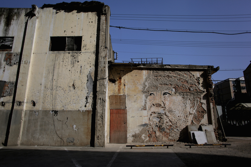 Work by Vhils in Shanghai in 2012. — Picture by Joao Moreira, courtesy of Urban Xchange. 