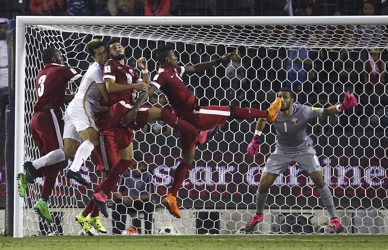 Zheng Zhi of China (second from left) jumps for a header next to Abdelkarim Hassan (left) and Ahmed Yasser Abdelrahman (third from right) of Qatar during their 2018 World Cup qualifying match in Doha, Qatar, October 8, 2015.u00c2u00a0u00e2u20acu201d Reuters pic