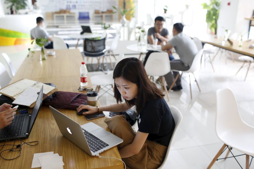 Young entrepreneurs look at their computers at a resting area inside the University Students Venture Park, in Shanghai, China, July 29, 2015. u00e2u20acu201d Reuters pic