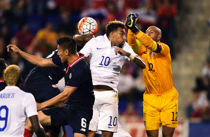 US goalkeeper Tim Howard (R) clears the ball during their international friendly match against Costa Rica at the Red Bull Arena in Harrison, New Jersey, on October 13, 2015. u00e2u20acu201d AFP pic