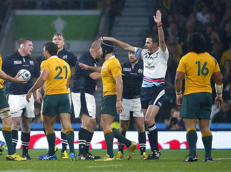 Referee Craig Joubert awards a penalty against Scotland's Jon Welsh (left) in the last minute of the game.