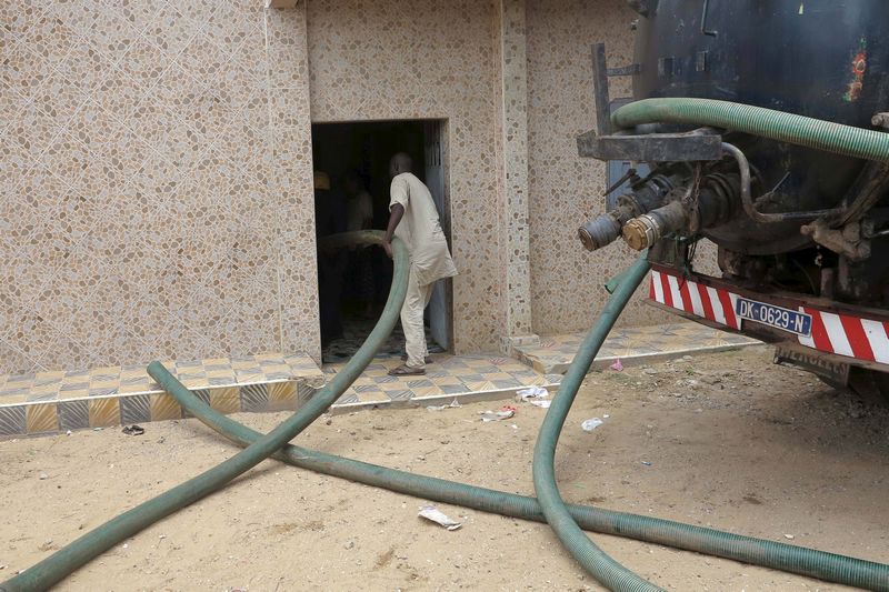 A sanitation truck removes septic waste from a house in Guediawaye, Senegal, August 19, 2015. u00e2u20acu201d Reuters pic