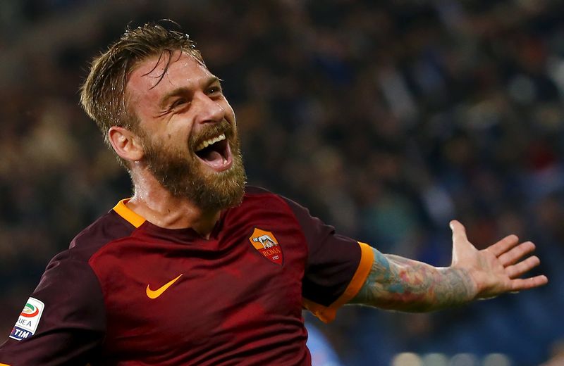 AS Roma's Daniele De Rossi celebrates after scoring against Empoli during their Italian Serie A match at the Olympic stadium in Rome, October 17, 2015. u00e2u20acu201d Reuters pic