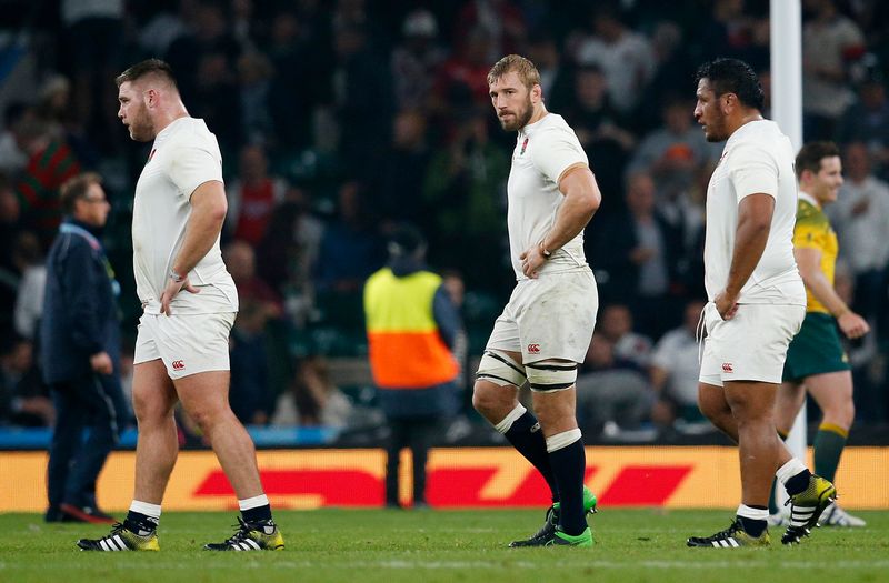 England's Chris Robshaw (centre) looks dejected at the end of the Rugby World Cup match against Australia at Twickenham, London October 3, 2015. u00e2u20acu201d Reuters pic