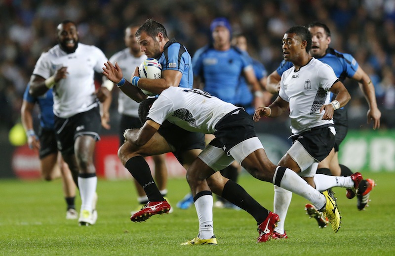 Fiji's Asaeli Tikoirotuma in action with Uruguay's Joaquin Prada during the Uruguay v IRB Rugby World Cup 2015 Pool A game at Stadium MK, Milton Keynes, England.u00c2u00a0u00e2u20acu201d Reuters picn