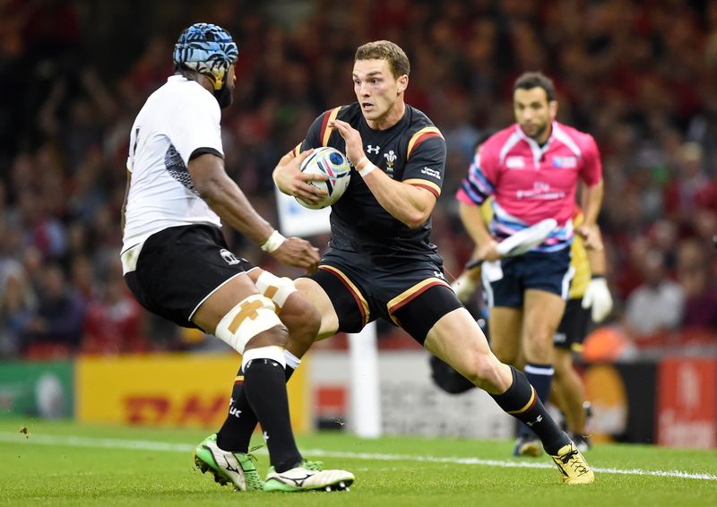 Wales' George North (centre) in action with Fiji's Tevita Cavubati in a Rugby World Cup match in Cardiff, October 1, 2015. u00e2u20acu201d Reuters pic