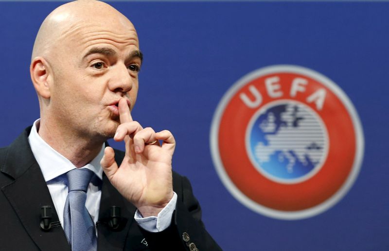 UEFA General Secretary Gianni Infantino asks the audience for silence before the draw for the play-off matches for UEFA Euro 2016 at the UEFA headquarters in Nyon, Switzerland, October 18, 2015. REUTERS/Denis Balibouse 