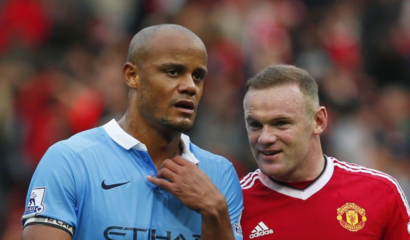 Manchester United v Manchester City - Barclays Premier League - Old Trafford - 25/10/15 Manchester Cityu00e2u20acu2122s Vincent Kompany and Manchester Unitedu00e2u20acu2122s Wayne Rooney Reuters / Eddie Keogh Livepic 