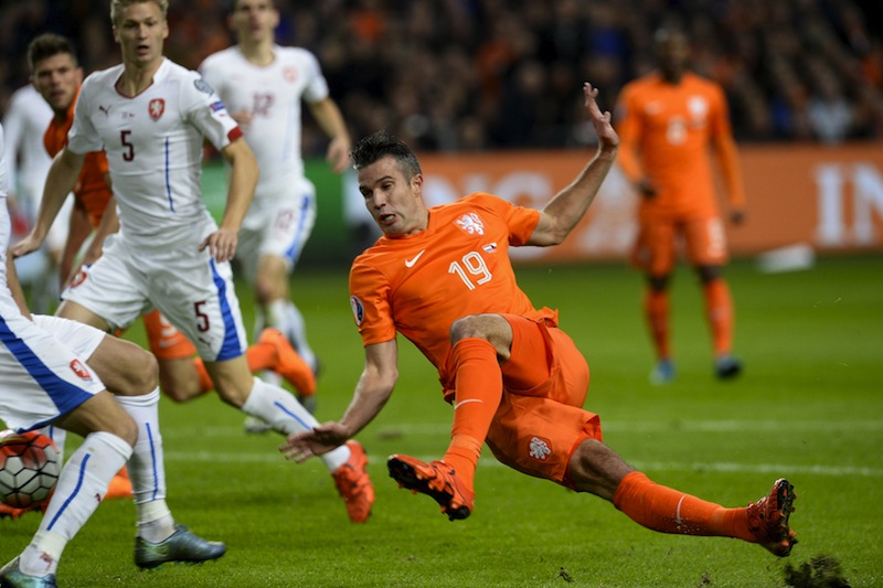 Robin van Persie of the Netherlands falls during the match against Czech Republic during their Euro 2016 group A qualifying match in Amsterdam, Netherlands October 13, 2015.u00c2u00a0u00e2u20acu201d Reuters pic