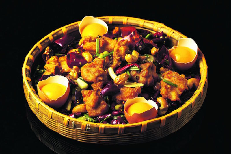 Egg yolks served on half shells in the Firecracker Nest Chicken dish are really blobs of mango puree. u00e2u20acu201d Lokkee pic via TODAYn