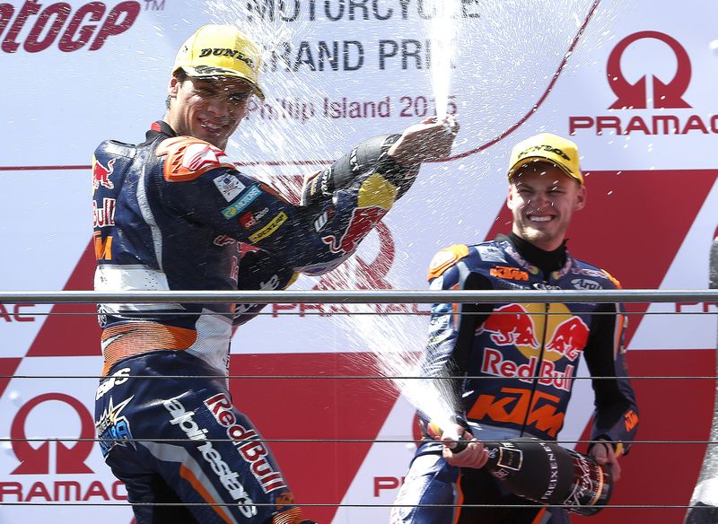 KTM Moto3 rider Miguel Oliveira of Portugal (left) celebrates with team mate Brad Binder from South Africa who finished third after winning the Australian Grand Prix on Phillip Island, October 18, 2015. u00e2u20acu201d Reuters pic