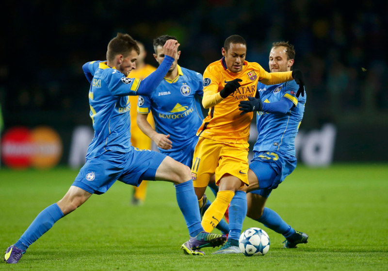 Barcelonau00e2u20acu2122s Neymar (second right) fights for the ball with BATE Borisovu00e2u20acu2122s players during their Champions League group E match at the Borisov Arena stadium outside Minsk, Belarus, October 20, 2015. u00e2u20acu201d Reuters pic