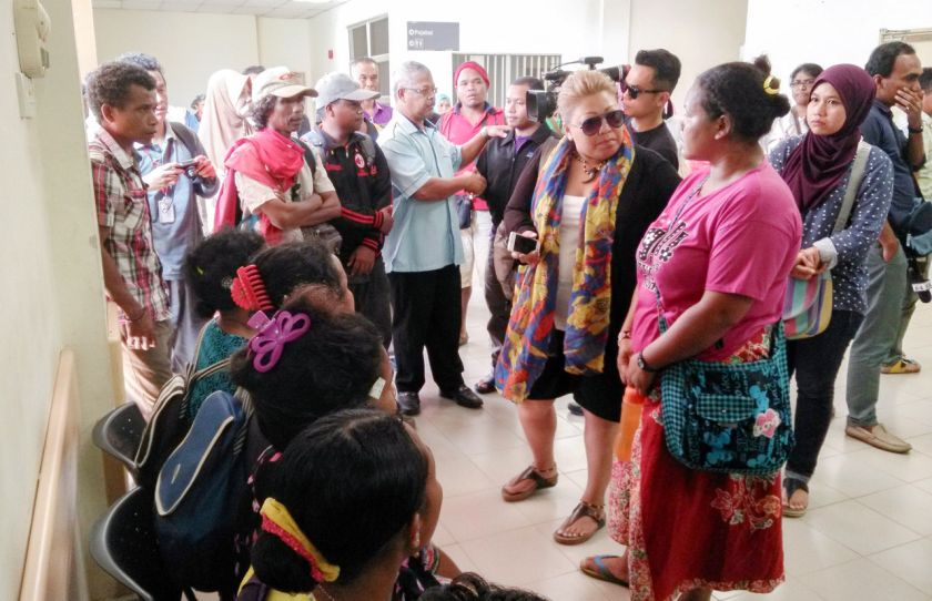 Family members of the missing orang asli school children are seen at the Gua Musang Hospital, Kelantan, October 8, 2015. u00e2u20acu201d Bernama pic