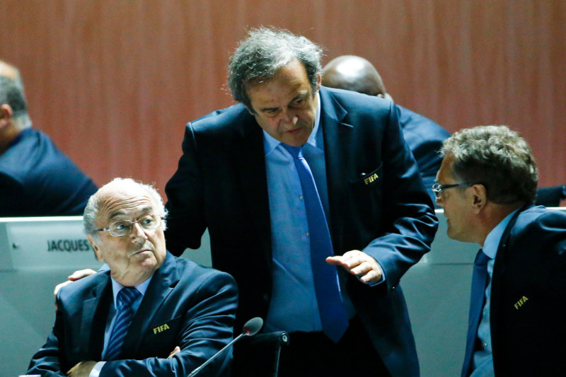 File picture shows UEFA President Michel Platini (centre) speaking with FIFA President Sepp Blatter (left) and Jerome Valcke, FIFA Secretary General at the 65th FIFA Congress in Zurich, Switzerland, in May 29, 2015. u00e2u20acu201d Reuters pic