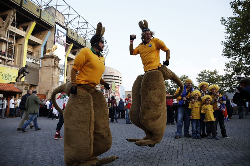 Entertainers dressed as wallabies perform outside Twickenham stadium, south west London, prior to a Pool A match of the 2015 Rugby World Cup between England and Australia, on October 3, 2015. AFP PHOTO / ADRIAN DENNIS