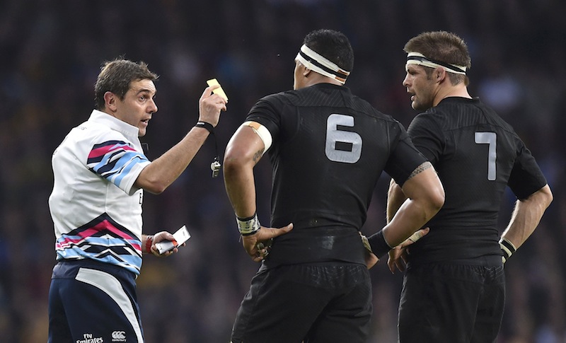 Referee Jerome Garces shows Jerome Kaino of New Zealand (centre) the yellow card during their Rugby World Cup semi-final match against South Africa at Twickenham in London, Britain October 24, 2015. u00e2u20acu201d Reuters pic