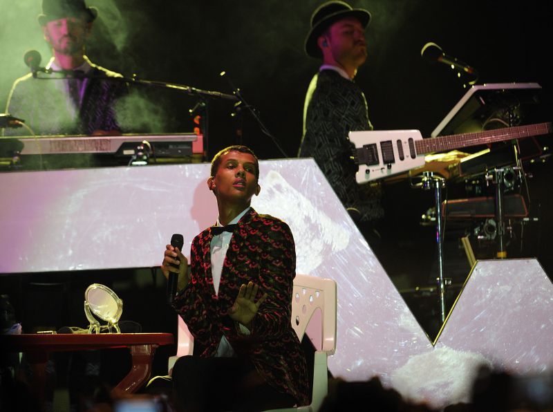 Belgian pop singer Paul Van Haver, aka Stromae, performs on October 17, 2015 in Kigali, Rwanda, last stop of his Africa tour, where his late father was killed during the 1994 genocide. AFP PHOTO/Tony KARUMBA