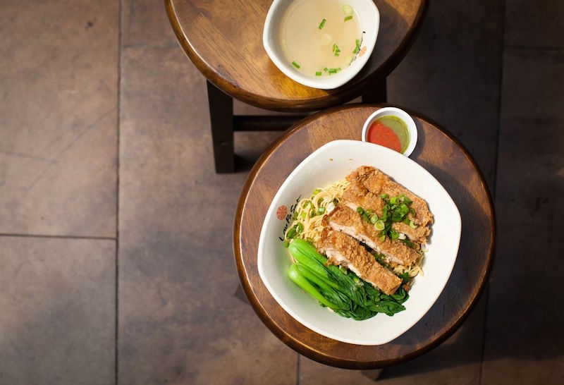 Chicken cutlet noodles and herbal duck bee hoon are some of the fare sold by new hawker Peter Mok, whose stall Noodle Evolution opened at Lau Pa Sat last December. — TODAY pic