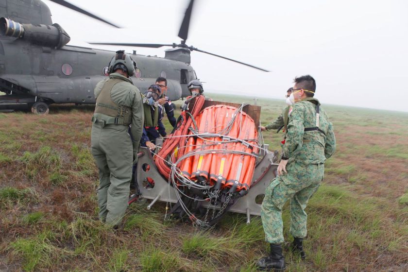 The Singapore Armed Forces helping out in water-bombing efforts in Palembang on Oct 11, 2015. u00e2u20acu201d TODAY pic