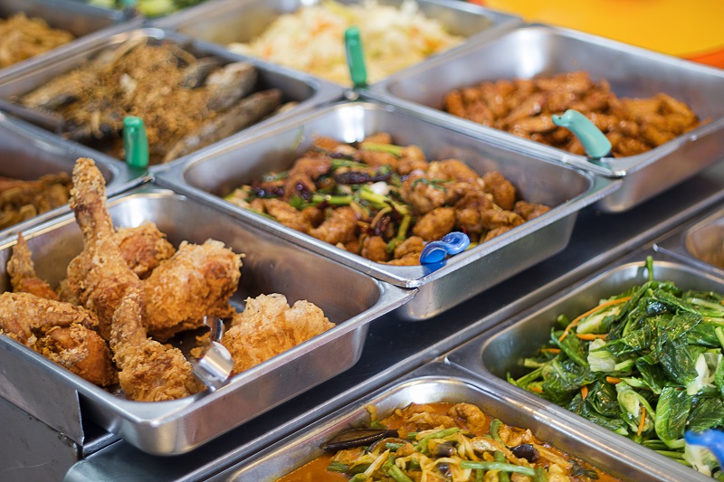 Freshly-cooked mixed rice dishes are available at Restoran Tuck Tuck Tei. 