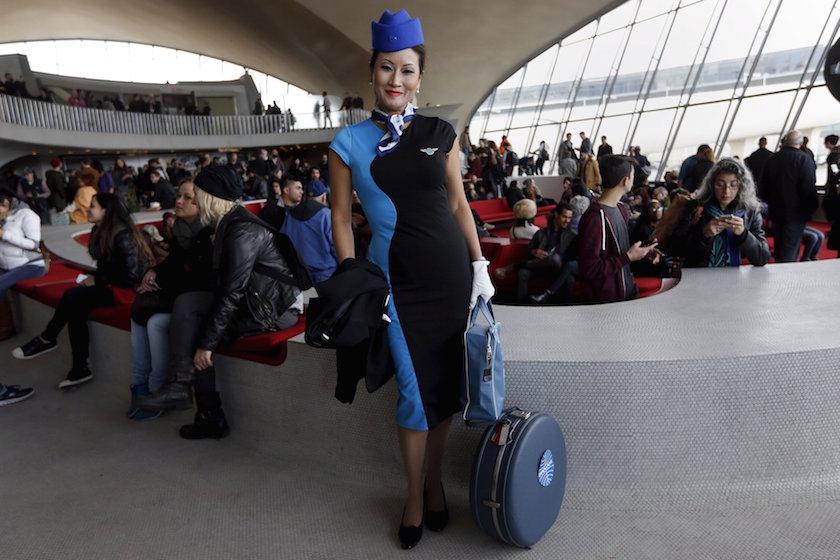 A woman poses inside the Trans World Airlines Flight Centre at John F Kennedy Airport in the Queens borough of New York, October 18, 2015. — Reuters pic