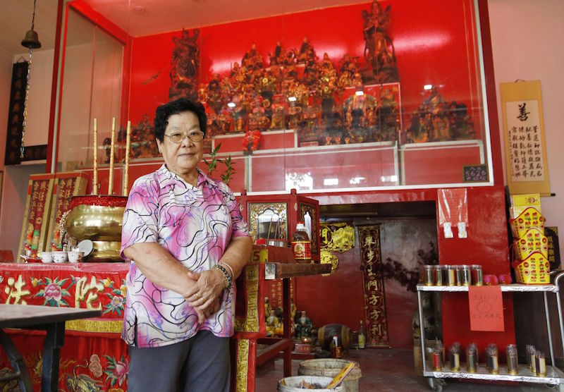 Ubin resident Ong Siew Fong, 72, who is one of the founders of the Wei To Temple. — TODAY pic