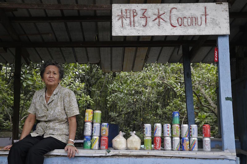 Farmer turned drink-seller Wang Xiao San, earns about S$400 to S$500 a month. — TODAY pic