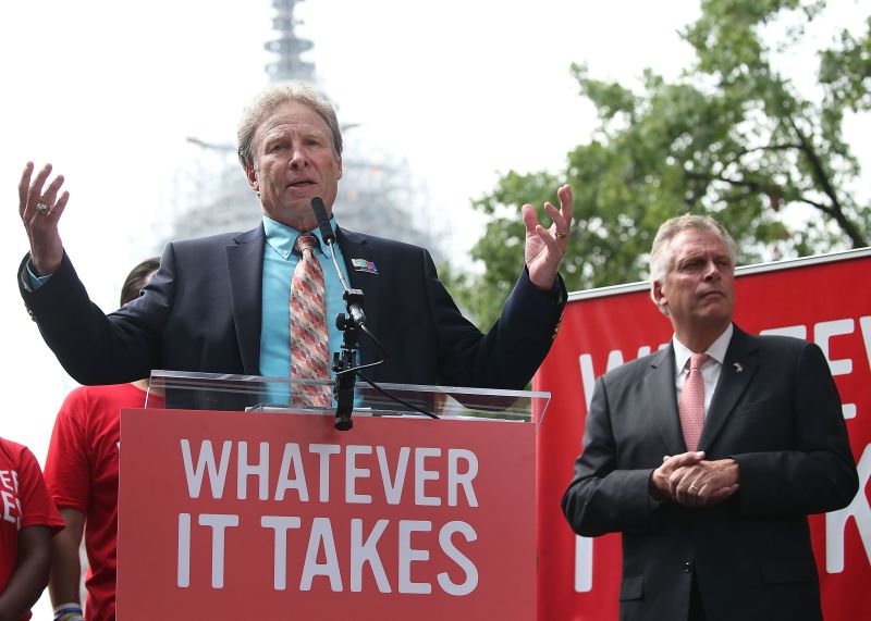 Andy Parker (left), whose 24-year-old daughter, a reporter, was shot dead during a live television broadcast in August, sees the presidential election as a referendum on guns. — AFP file pic