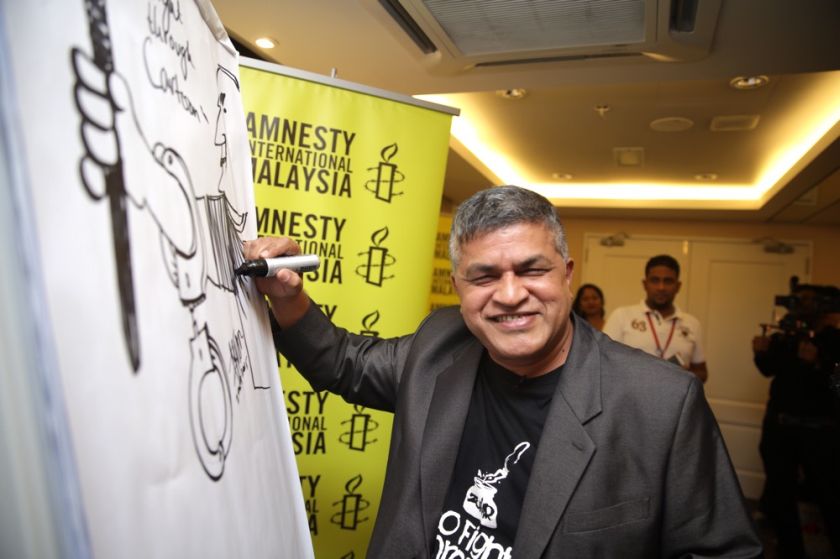 Cartoonist Zulkiflee Anwar Ulhaque is selected as the first Malaysian to be a part of Amnesty Internationalu00e2u20acu2122s u00e2u20acu02dcWrite for Rightsu00e2u20acu2122 (W4R) 2015 campaign at Best Western Hotel, Petaling Jaya, October 2, 2015. u00e2u20acu201d Picture by Choo Choy Maynn