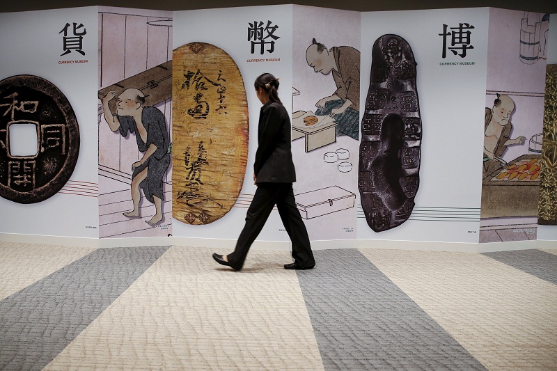 A woman walks past a display of historical money at the Currency Museum of the Bank of Japan in Tokyo. Picture released November 20, 2015. u00e2u20acu201d Reuters pic