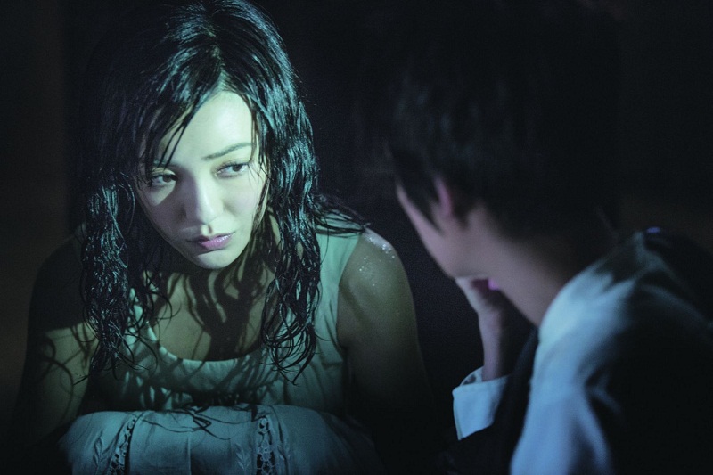 Film still from Nick Cheung’s sophomore directorial project Keeper of Darkness, where he plays an exorcist Fatt. Amber Kuo plays his dead girlfriend Shuet. — Picture courtesy of Encore Films/TODAY