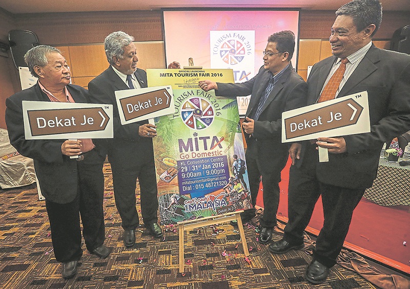 (From left) Lee, Mirza, Uzaidi and Iskandar at the launch of the fair yesterday. u00e2u20acu201d Picture by Firdaus Latif