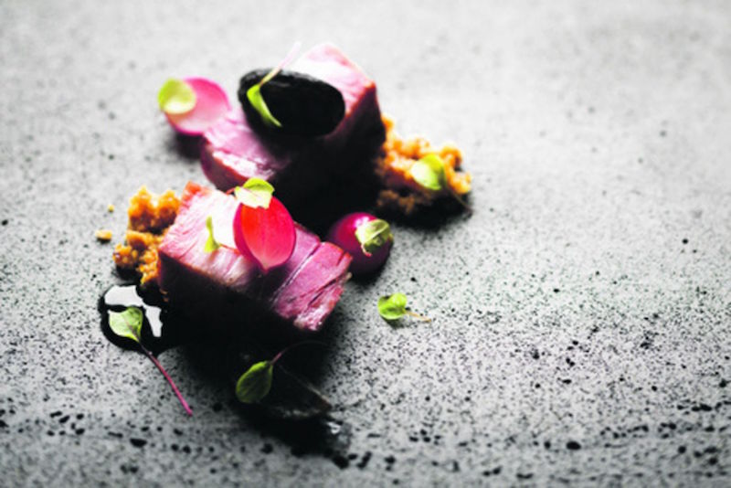 Pork collar, radishes and praline from the Grilled, Seared, Charred selection. u00e2u20acu201d TODAY pic