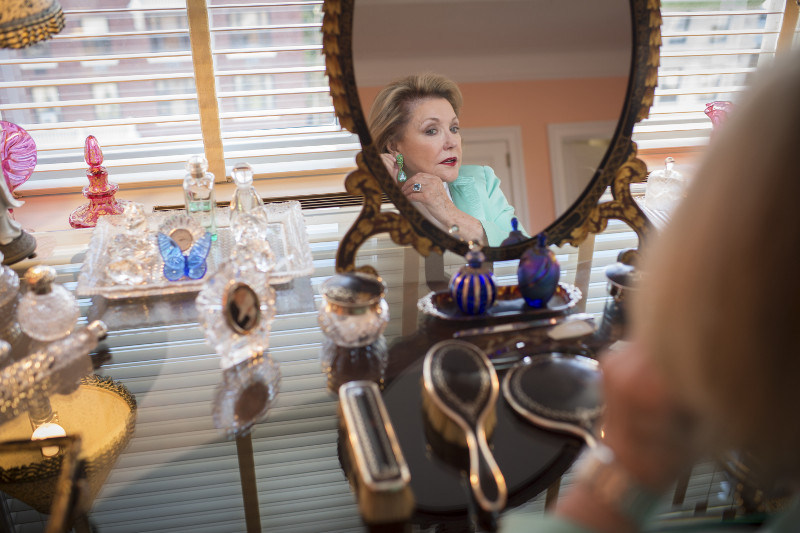 Novelist Barbara Taylor Bradford, who owns a vast jewellery collection, with a pair of emerald aquamarine earrings from Verdura, at her apartment in New York, October 15, 2015.