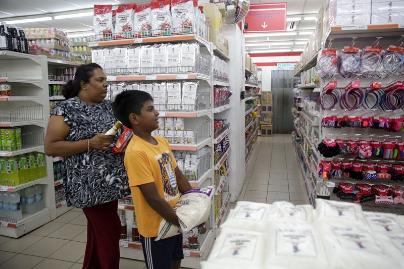 Shoppers at one of the existing 170 outlets under the KR1M retail chain. — Picture by Choo Choy May