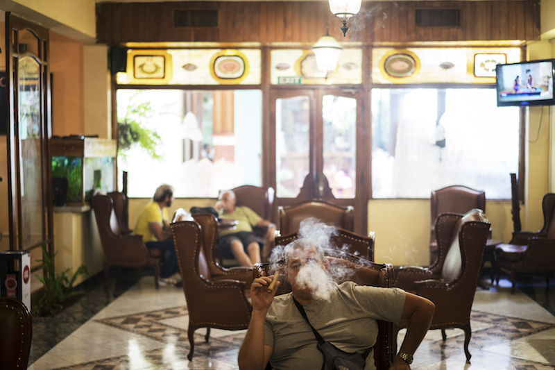 Customers at La Casa del Habano, one of Havana’s better known cigar stores, in the Miramar neighbourhood of Havana, May 28, 2015. — Picture by Todd Heisler/The New York Times