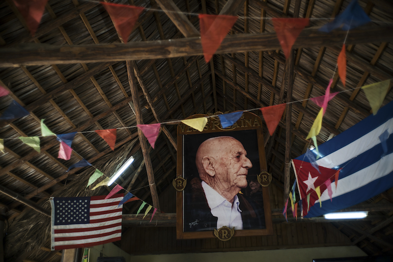 A photo of the late owner Alejandro Robaina in the rafters of a work building at the Vegas Robaina tobacco plantation, west of Havana in San Luis, Cuba, May 29, 2015. — Picture by Todd Heisler/The New York Times
